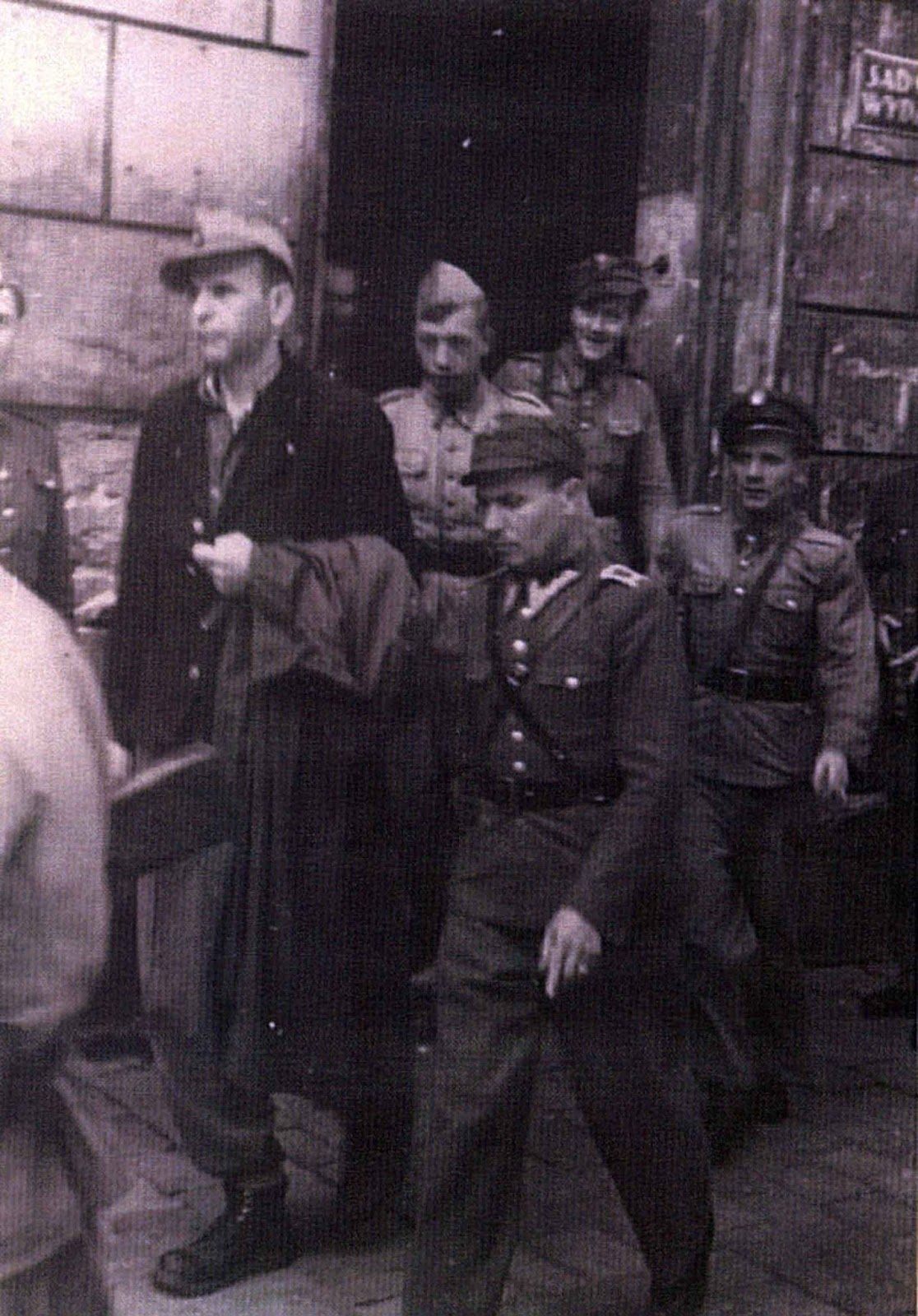 Camp Commandant Amon Goeth, infamous from the movie “Schindler’s List”, standing on his balcony preparing to shoot prisoners, 1943