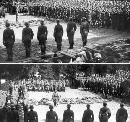 Diese eindrucksvolle Aufnahme zeigt eine Zeremonie, bei der deutsche Soldaten während des Zweiten Weltkriegs ihren gefallenen Kameraden die letzte Ehre erweisen.